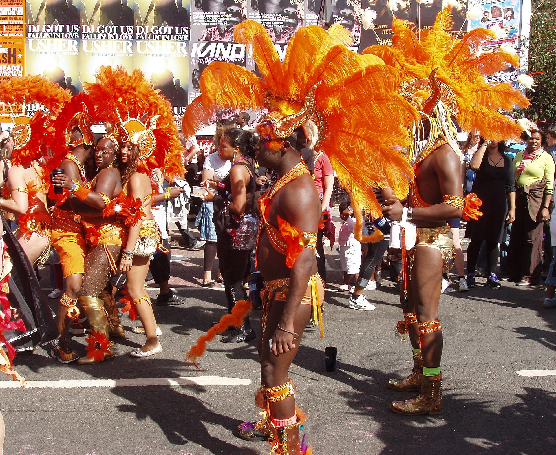 Carnival dancers in costume performing on the street, the tradition Panorama and the parade grew out of.